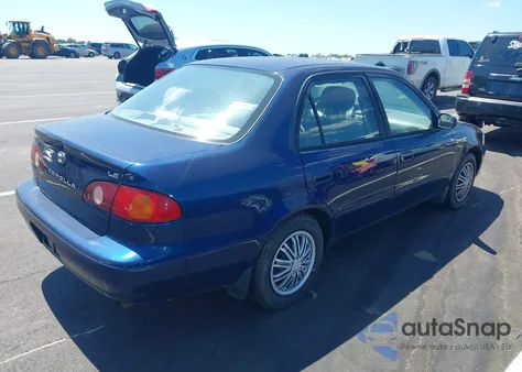 2002 Toyota Corolla Le из США, поврежденный, VIN 2T1BR12E52C558044